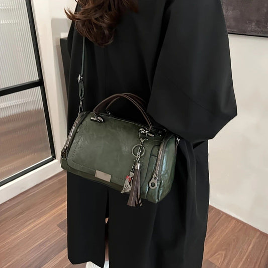Vintage Tote Bag: Spacious multi-pocket design with tassel and metal accents, supports multiple carrying V1232-FGSTB002