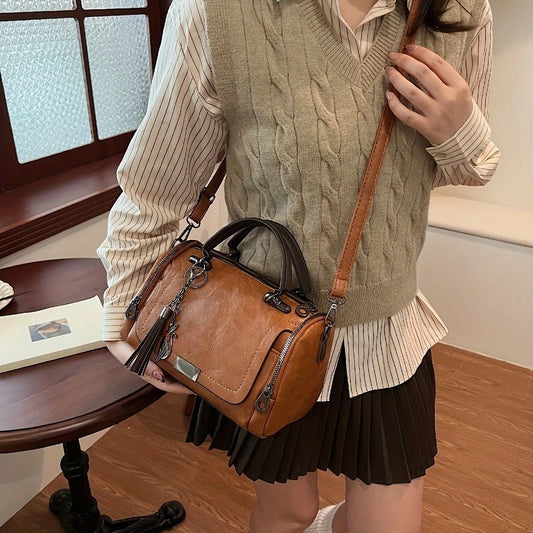 Vintage Tote Bag: Spacious multi-pocket design with tassel and metal accents, supports multiple carrying V1232-FGSTB003