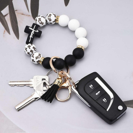 Black and White Silicone Bead Keychain Bracelet with Cross Charm and Tassel - Black, White, Teal, Leopard V888-ELOSUNG50614