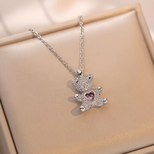 A delicate and adorable pink heart-shaped bear pendant copper necklace, adorned with synthetic zirconia, V1102-XDZXL001