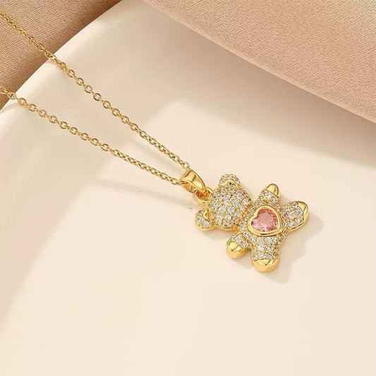 A delicate and adorable pink heart-shaped bear pendant copper necklace, adorned with synthetic zirconia, V1102-XDZXL002