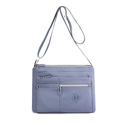 Lightweight Nylon Crossbody Shoulder Bag with Multi Pockets and Adjustable Strap, Light Blue V1188-MS-617-082