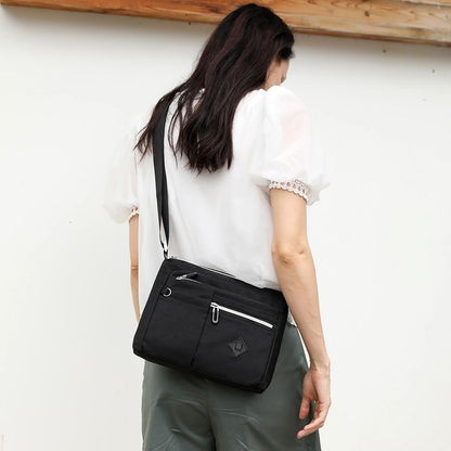 Lightweight Nylon Crossbody Shoulder Bag with Multi Pockets and Adjustable Strap, Light Blue V1188-MS-617-082