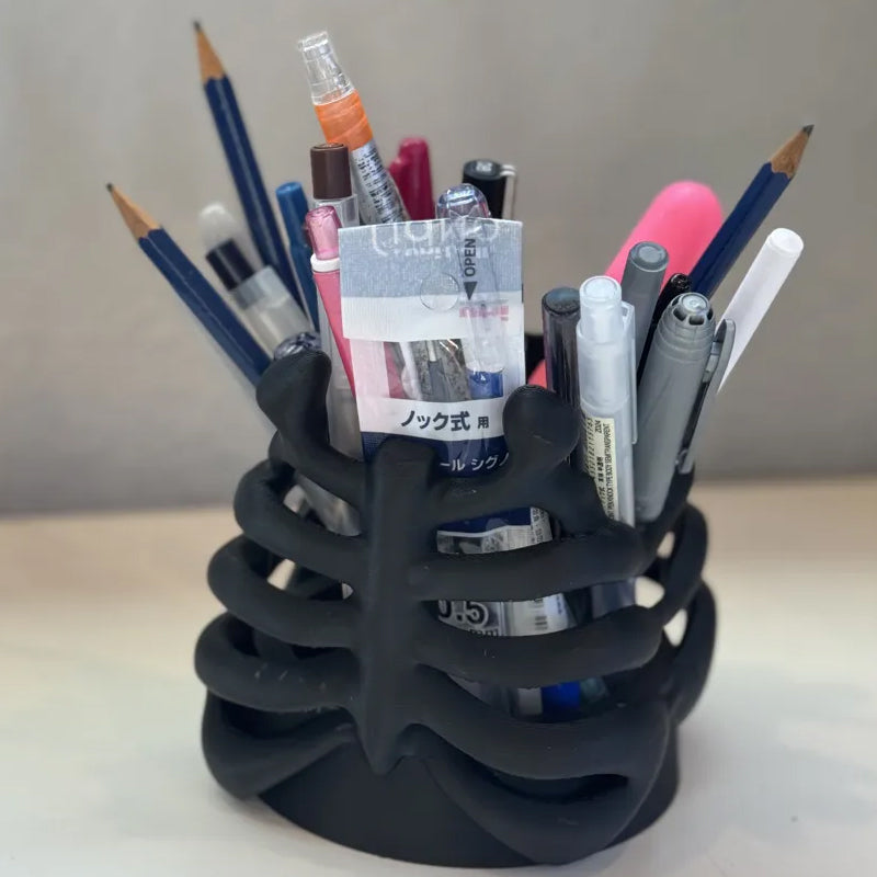 3D Printed Rib Pen Holder - Skeleton Desktop Organizer is both a practical pen holder and a sculpture. V1195-VYY0013