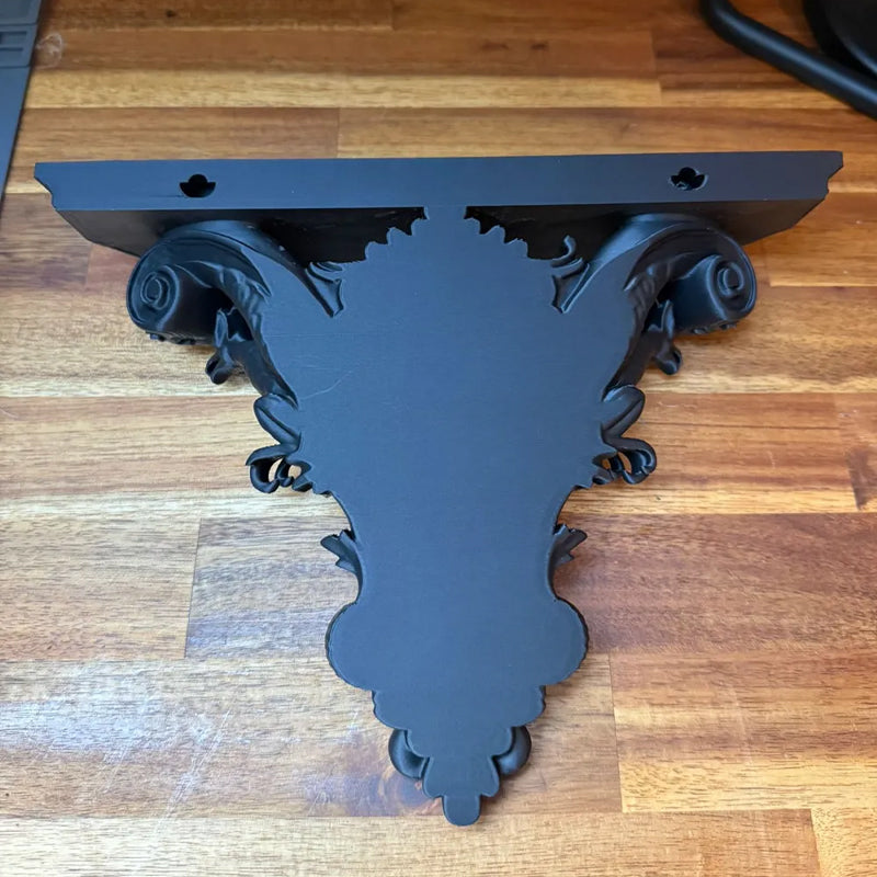 3D-printed Gothic wall shelf brackets add a touch of classic Gothic elegance to your interior. Black V1195-VYY0039