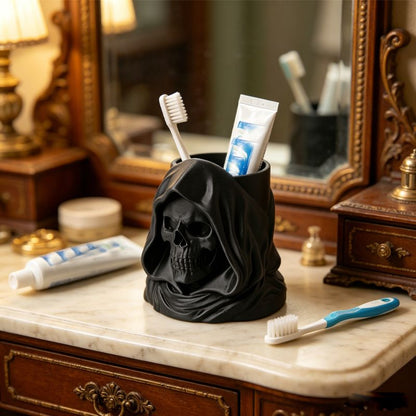 3D-printed hooded skull organizer, perfect for storing toothbrushes and toothpaste in your bathroom. Black. V1195-VYY0095