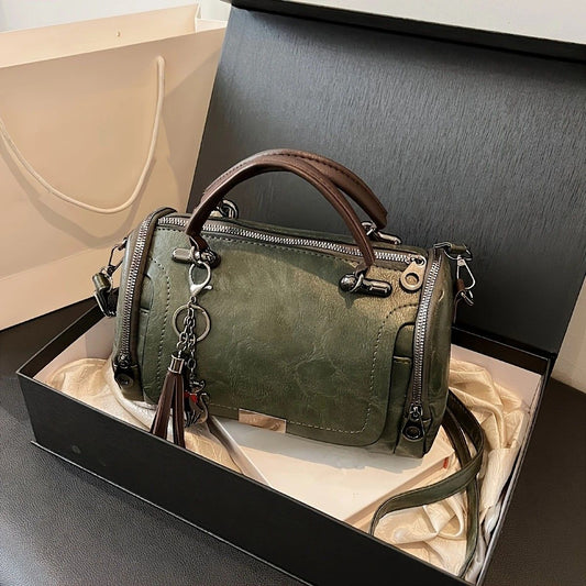 Vintage Tote Bag: Spacious multi-pocket design with tassel and metal accents, supports multiple carrying V1232-FGSTB002