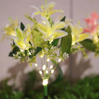 Seven Branch Solar Lily Light: Charges during the day, glows at night. Seven lilies bloom together, soft light flows like water through your garden./white
