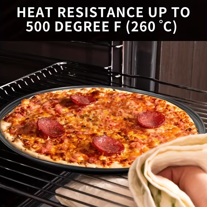 Two pizza baking pans, each 30.48 cm in diameter, feature ventilation holes for improved cooking efficiency V1345-SY54