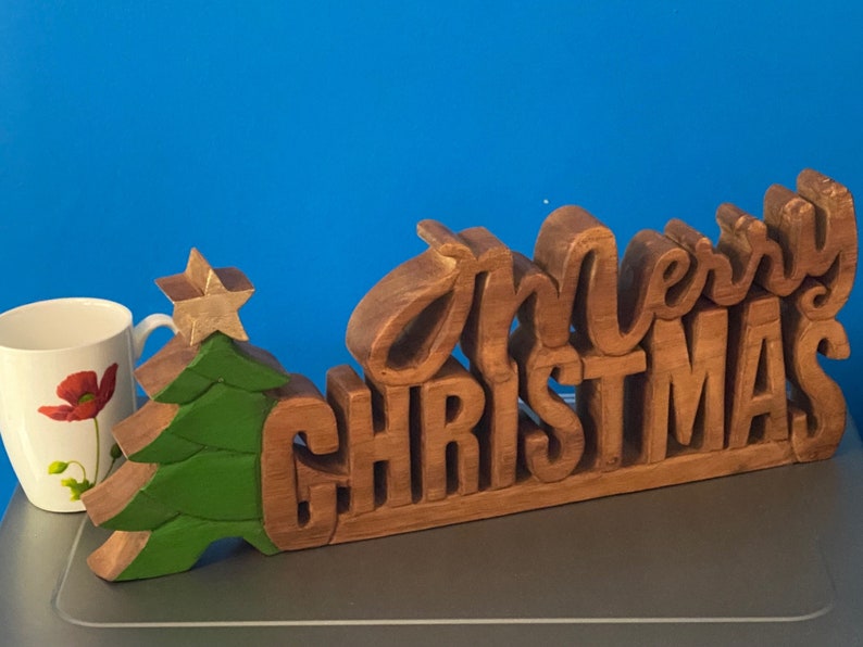 Wooden carved Merry Christmas decoration 38 cm long with Tree and Star V277-WCMCD38