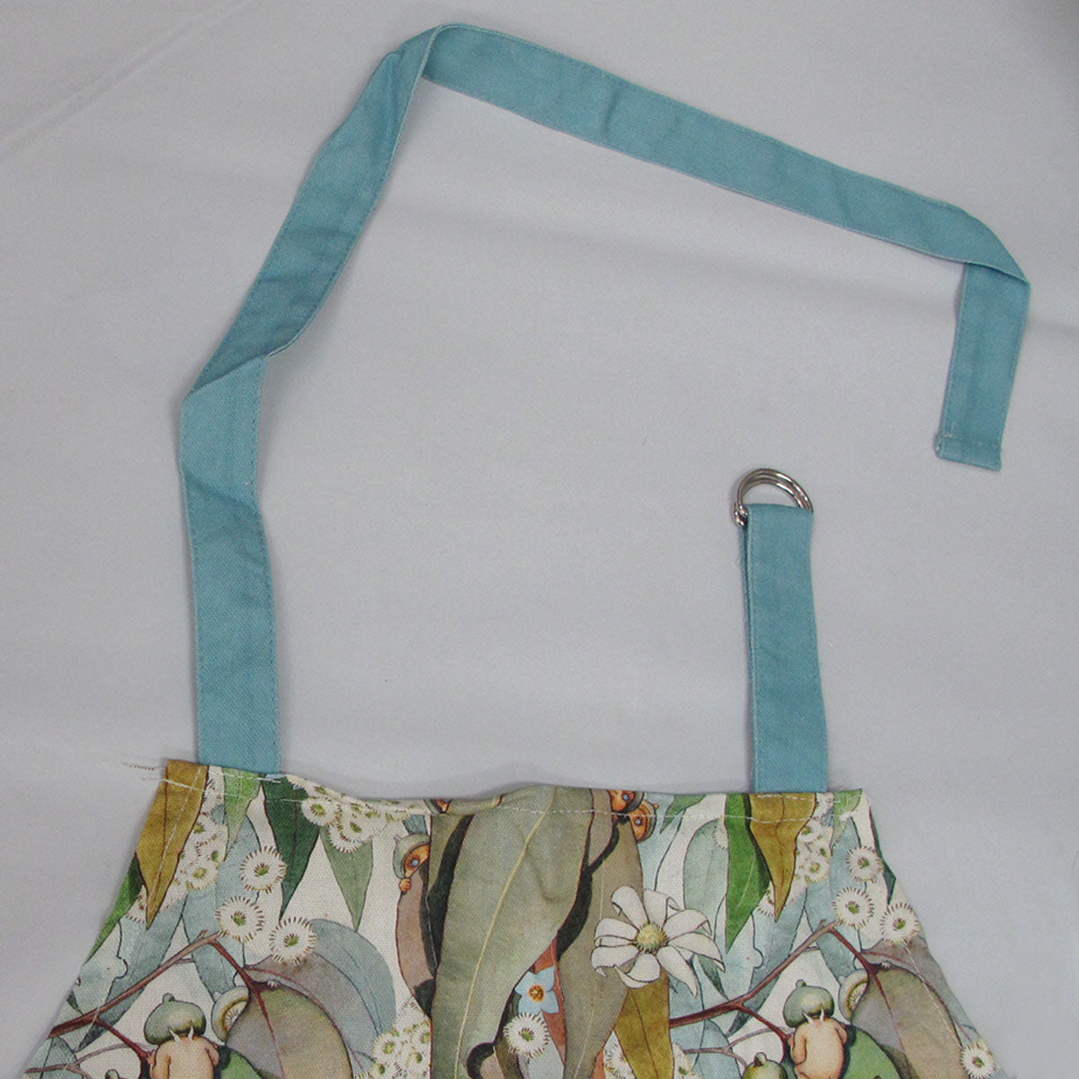 May Gibbs Gumnut Baby Cotton Apron 60 x 85 cm V442-JTC-APRON-GUMNUTBABY-MULTI-SH