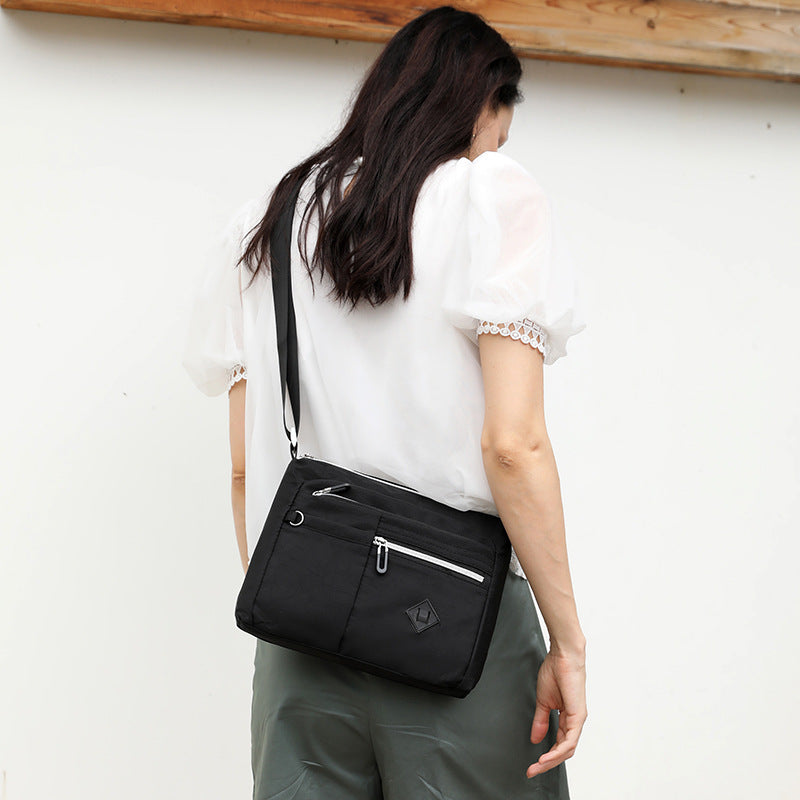 Lightweight Nylon Crossbody Shoulder Bag - Light Blue, Adjustable Strap, Multi-Pocket Design V888-ELOSUNG15159