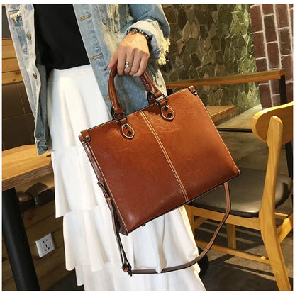 Brown Elegant Leather Handbag - Stylish Brown Tote with Adjustable Strap, Spacious and Durable V888-ELOSUNG16692
