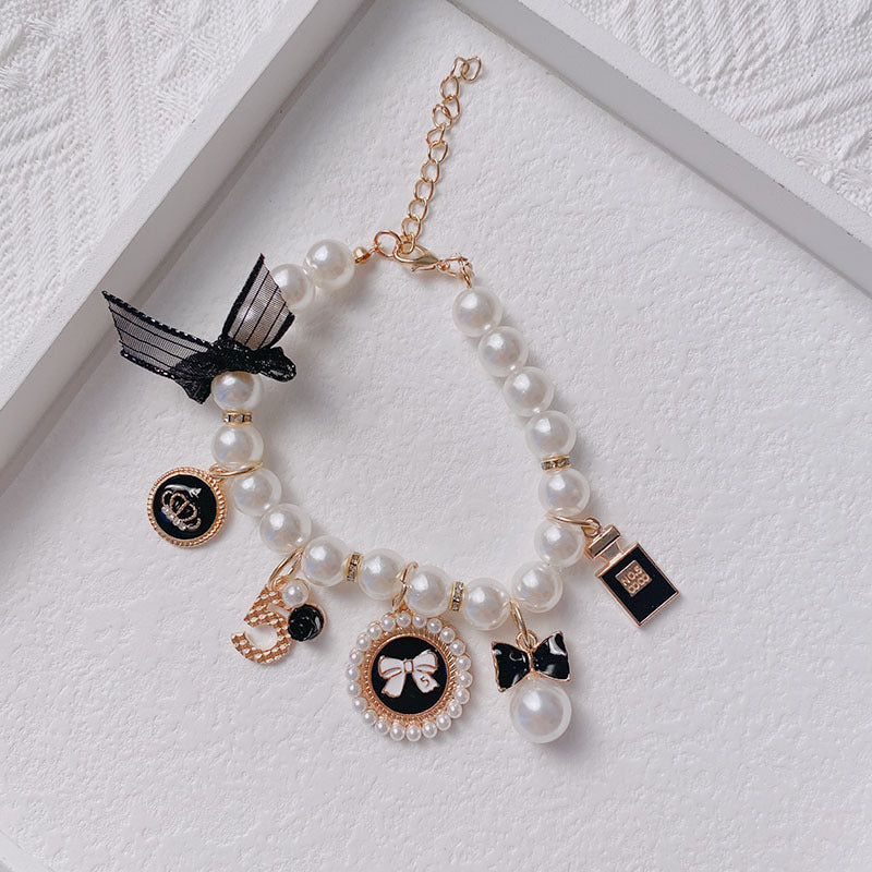 Black 4-PCS Pearl Charm Pet Necklace - Adjustable Bowknot Collar for Small Dogs & Cats (S: 20+5CM) V888-ELOSUNG22521