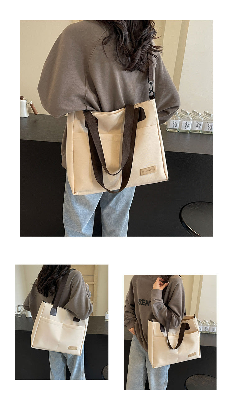 Stylish white canvas tote bag with detachable shoulder strap V888-ELOSUNG25001