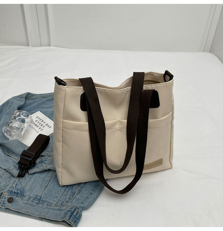 Stylish khaki canvas tote bag with detachable shoulder strap V888-ELOSUNG25002