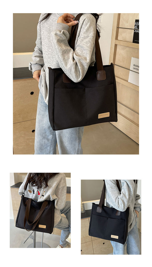 Stylish black canvas tote bag with detachable shoulder strap V888-ELOSUNG25003