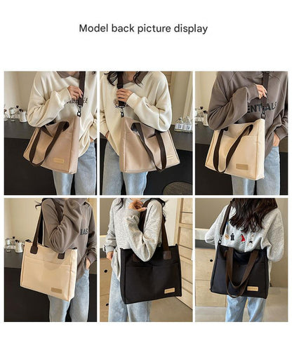 Stylish black canvas tote bag with detachable shoulder strap V888-ELOSUNG25003