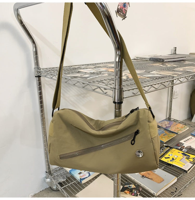 An elegant khaki shoulder bag for travel and work V888-ELOSUNG25010
