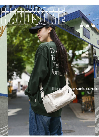 An elegant white shoulder bag for travel and work V888-ELOSUNG25011
