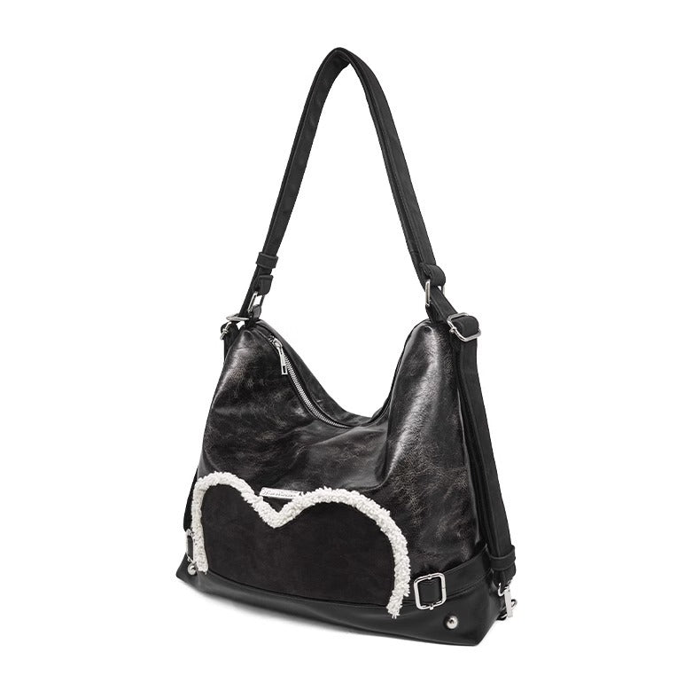Stylish black tote backpack with heart embellishment - can be worn on one shoulder or as a backpack V888-ELOSUNG26250