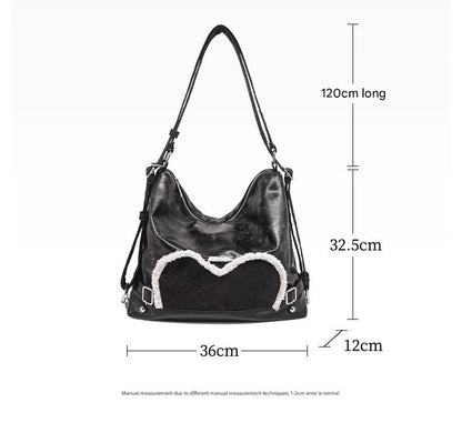 Stylish black tote backpack with heart embellishment - can be worn on one shoulder or as a backpack V888-ELOSUNG26250