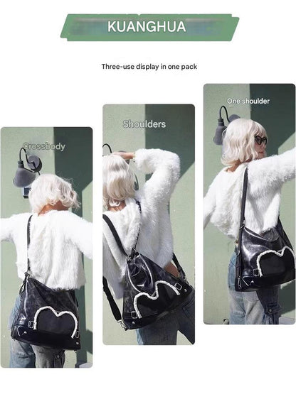 Stylish black tote backpack with heart embellishment - can be worn on one shoulder or as a backpack V888-ELOSUNG26250