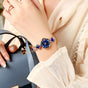 Blue Women's Four-Leaf Clover Quartz Watch with Red Dial and Crystal Accents V888-ELOSUNG26282