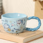 Whimsical Cat & Friends Ceramic Mug - 320ml with Unique Twisted Handle (Blue) V888-ELOSUNG29118
