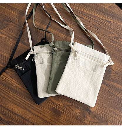 Black Minimalist Lightweight Nylon Crossbody Phone Bag - Compact & Stylish for Women V888-ELOSUNG36846