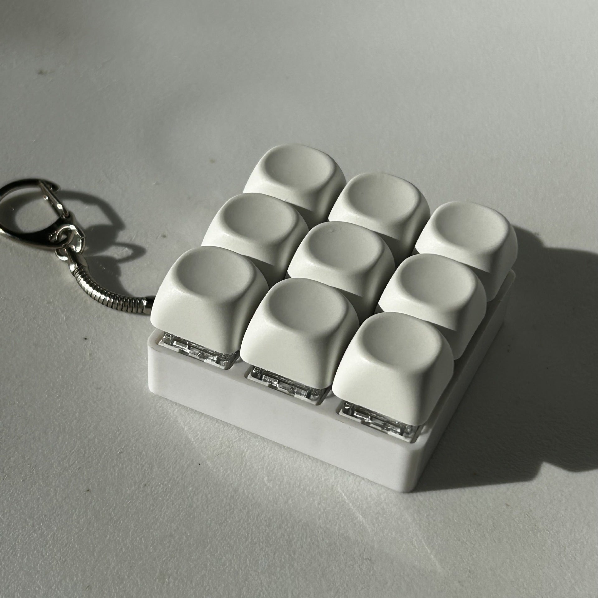 2-Pack White Mechanical 9-Keyboard Fingertip Toy Keychain - Key Pressure Relief, PVC Fingertip Toy V888-ELOSUNG39628