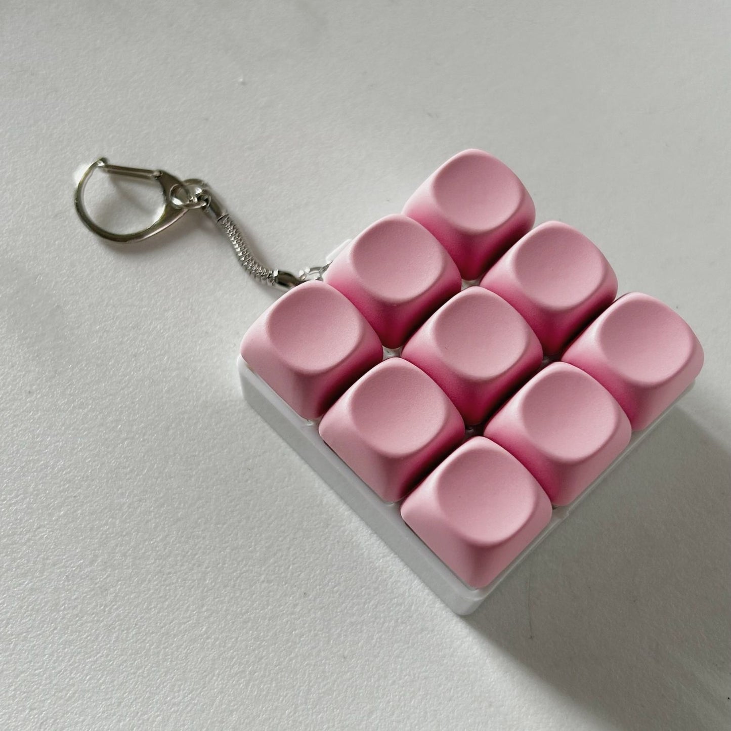 2-Pack Dark Pink Mechanical 9-Keyboard Fingertip Toy Keychain - Key Pressure Relief, PVC Fingertip Toy V888-ELOSUNG39630
