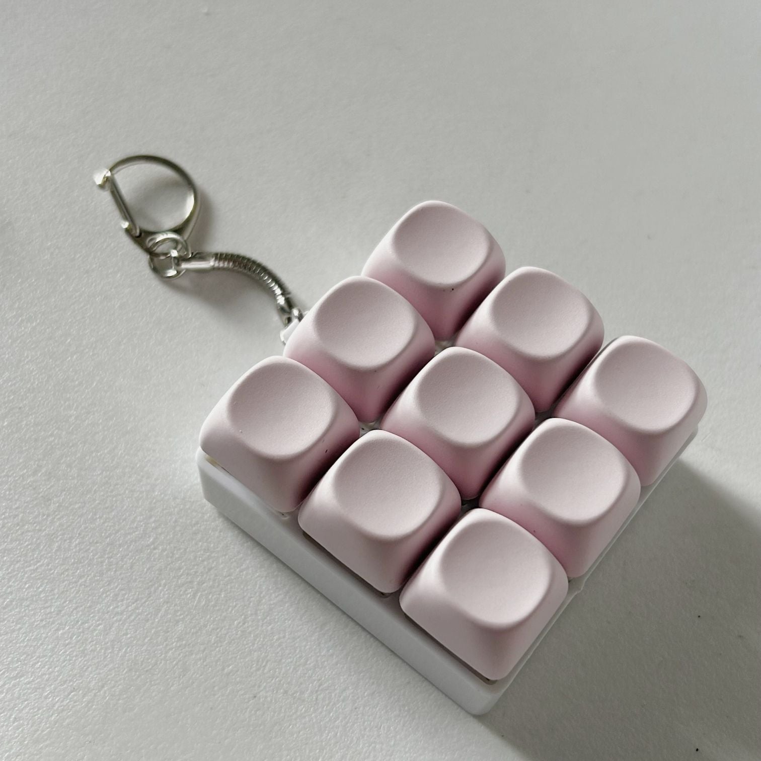 2-Pack Light Pink Mechanical 9-Keyboard Fingertip Toy Keychain - Key Pressure Relief, PVC Fingertip Toy V888-ELOSUNG39633