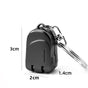 Small backpack style gun black Compact Folding Nail Clippers with Stainless Steel Blade and Keychain Design V888-ELOSUNG43423