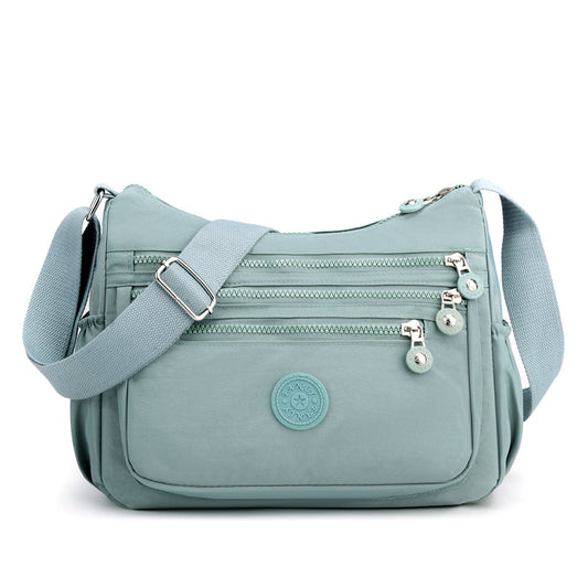 Women's Lightweight Nylon Crossbody Bag Waterproof Multi Pocket Shoulder Purse Travel Messenger Aqua Blue V888-ELOSUNG44014