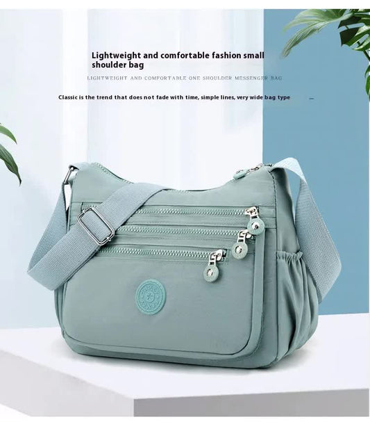 Women's Lightweight Nylon Crossbody Bag Waterproof Multi Pocket Shoulder Purse Travel Messenger Aqua Blue V888-ELOSUNG44014