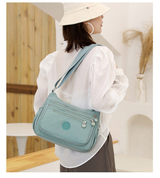 Black Versatile Nylon Multi-Pocket Crossbody Bag - Lightweight Casual Travel Purse, Waterproof Horizontal V888-ELOSUNG45325
