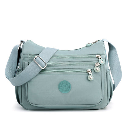 Light Blue Versatile Nylon Multi-Pocket Crossbody Bag - Lightweight Casual Travel Purse, Waterproof V888-ELOSUNG45326